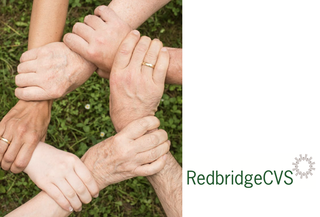 People's hands forming a circle by holding each other's wrists as a sign of support