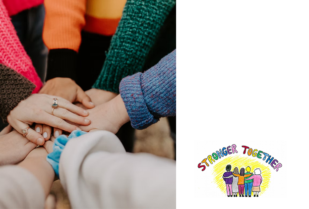 People's hands forming a circle by holding each other's wrists as a sign of support