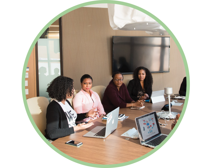 A group of black women in a meeting