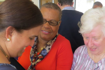 Close up of 3 Healthwatch Redbridge staff and volunteers