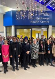 A photo of a group of people stood in front of the new Ilford Exchange Health Centre