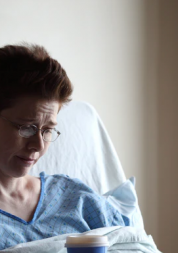 Female patient in hospital bed